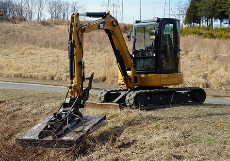 mini excavator cutting brush|clearing brush with mini excavator.